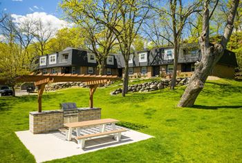 grilling area with a picnic table  at Preserve West, Wisconsin
